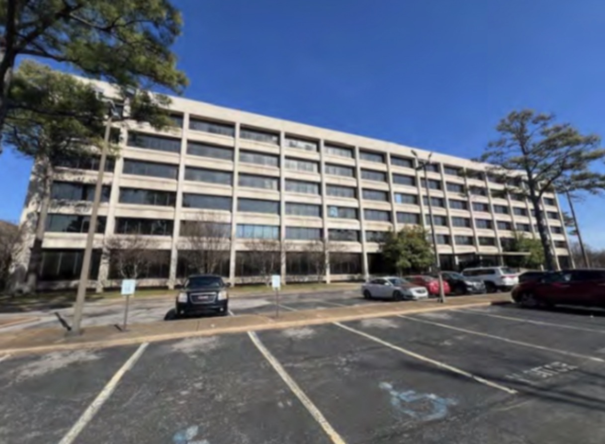 Six story office tower exterior on the campus
