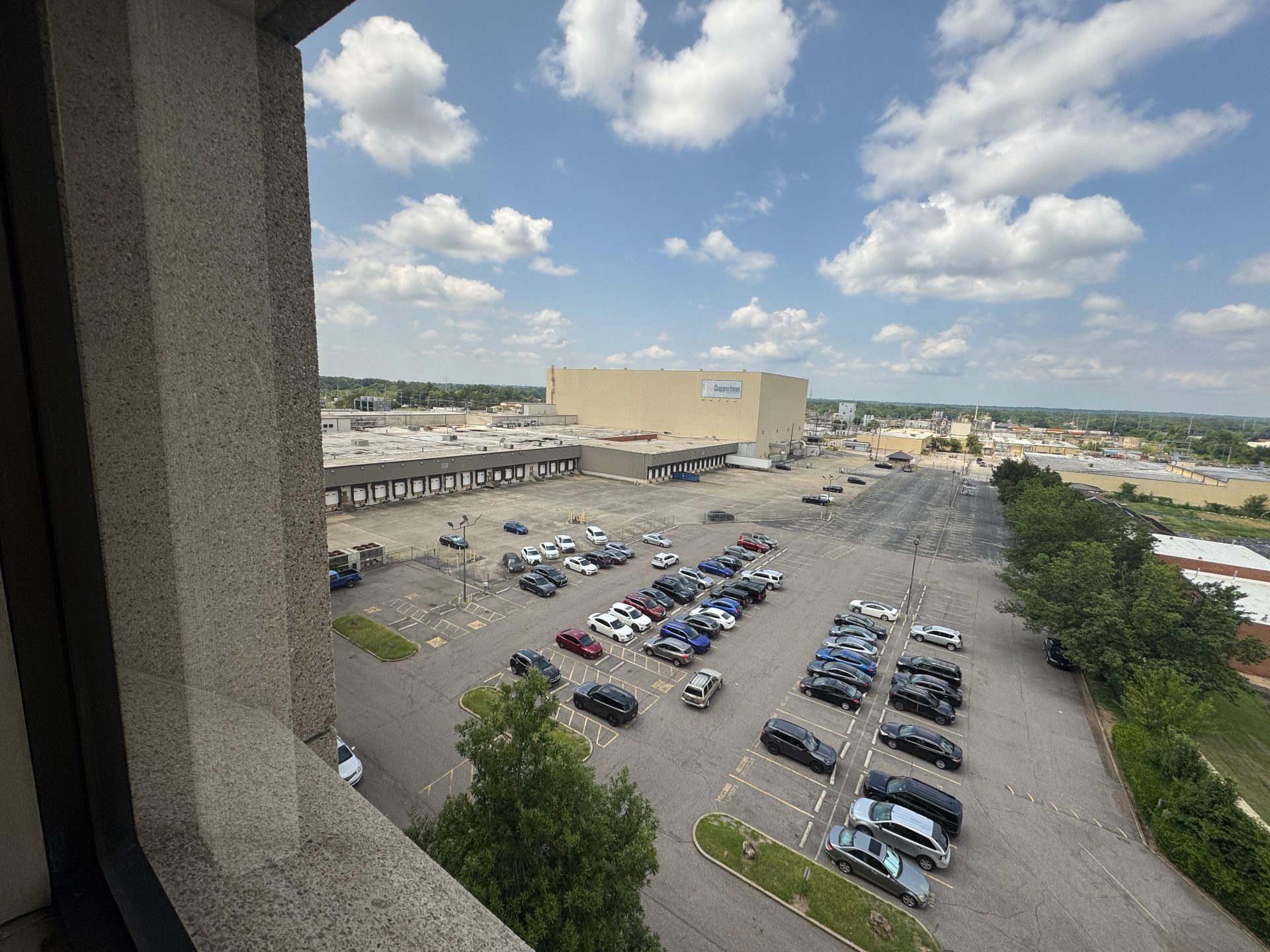 View from the office tower over the loading docks toward the high-bay building